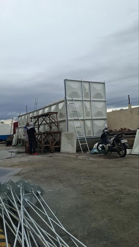 GRP tank assembly in progress on site in Taguig, built tier by tier without a crane